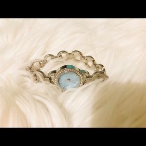 Silver and blue watch